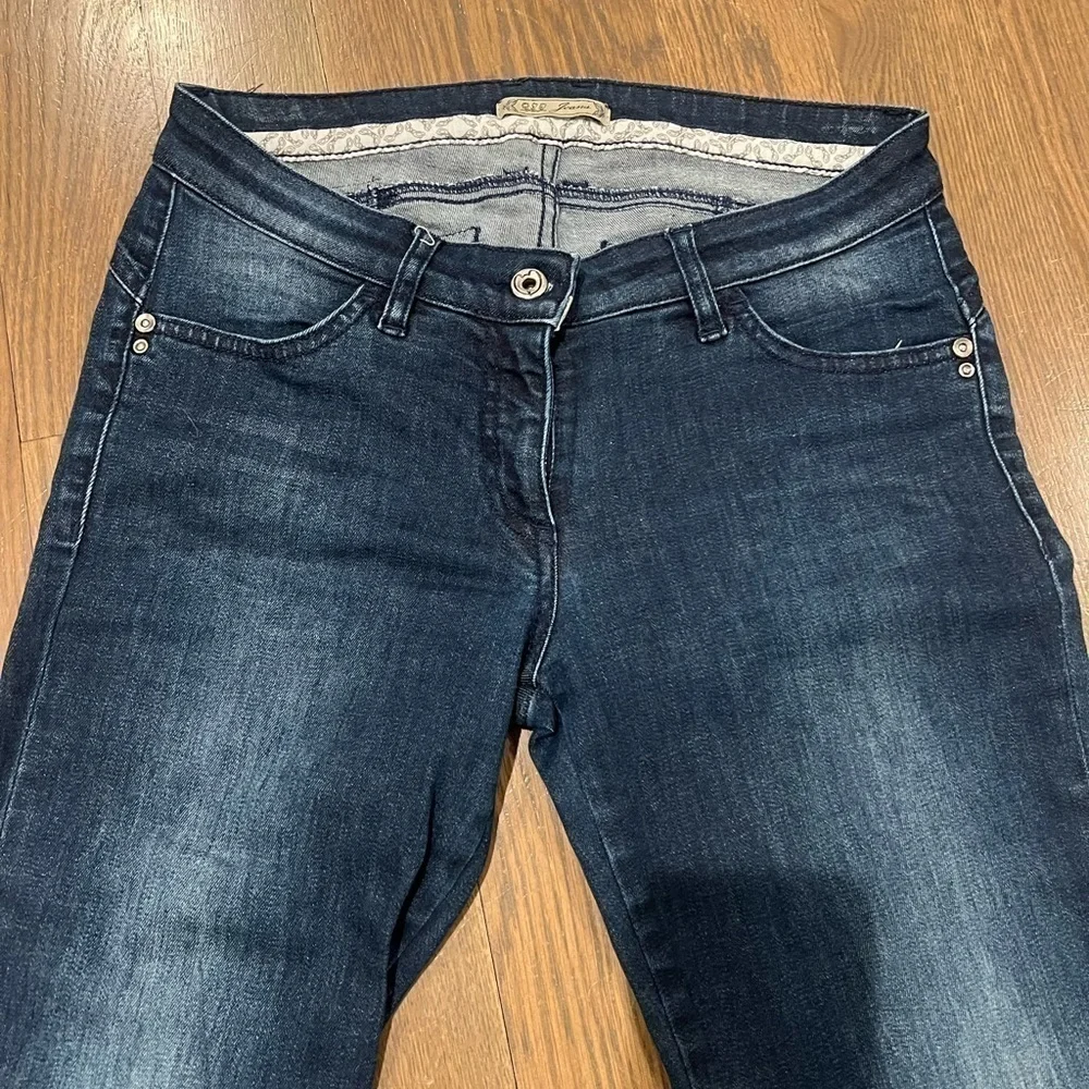 Vintage designer jeans size 28. Not sure the brand